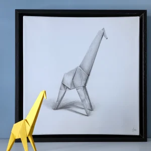 A hyperrealistic drawing with a 3D effect depicting an origami giraffe, created by artist Magali Lapeyre-Mirande, on watercolor paper stretched over a frame and mounted in a shadow box